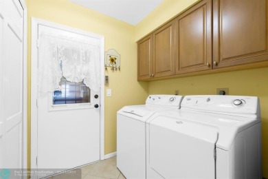 Discover your dream home at 10893 Ventura Cir in a serene on Pine Tree Golf Club in Florida - for sale on GolfHomes.com, golf home, golf lot
