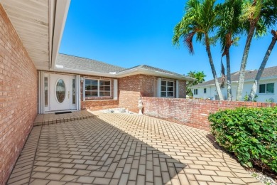 Discover your dream home at 10893 Ventura Cir in a serene on Pine Tree Golf Club in Florida - for sale on GolfHomes.com, golf home, golf lot