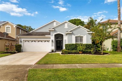 This stunning 3-bedroom, 2.5-bathroom pool home offers the on Hunters Creek Golf Course in Florida - for sale on GolfHomes.com, golf home, golf lot