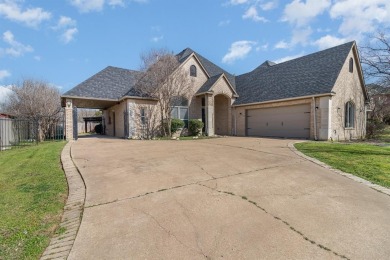 Welcome to this stunning residence situated in the picturesque on Tangle Ridge Golf Club in Texas - for sale on GolfHomes.com, golf home, golf lot