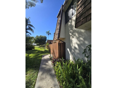 Wake up every morning to a serene golf course and water views in on Pine Island Ridge Country Club in Florida - for sale on GolfHomes.com, golf home, golf lot