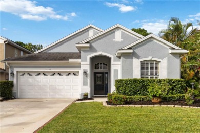 This stunning 3-bedroom, 2.5-bathroom pool home offers the on Hunters Creek Golf Course in Florida - for sale on GolfHomes.com, golf home, golf lot