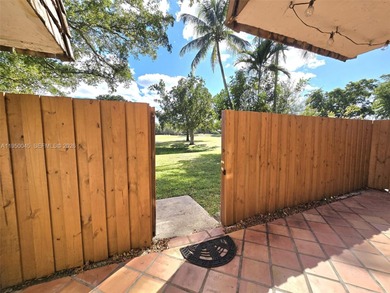 Wake up every morning to a serene golf course and water views in on Pine Island Ridge Country Club in Florida - for sale on GolfHomes.com, golf home, golf lot