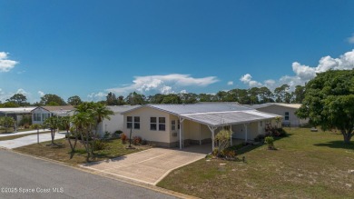 Welcome home to this mmaculate move-in-ready 2 bedroom 2 bath on Barefoot Bay Golf Course in Florida - for sale on GolfHomes.com, golf home, golf lot