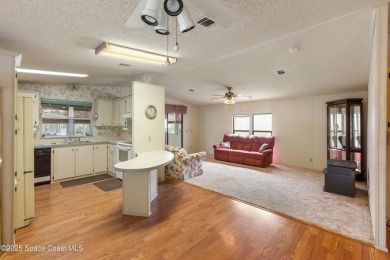 Welcome home to this mmaculate move-in-ready 2 bedroom 2 bath on Barefoot Bay Golf Course in Florida - for sale on GolfHomes.com, golf home, golf lot