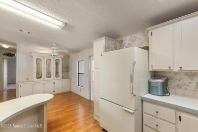 Welcome home to this mmaculate move-in-ready 2 bedroom 2 bath on Barefoot Bay Golf Course in Florida - for sale on GolfHomes.com, golf home, golf lot