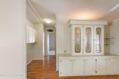 Welcome home to this mmaculate move-in-ready 2 bedroom 2 bath on Barefoot Bay Golf Course in Florida - for sale on GolfHomes.com, golf home, golf lot