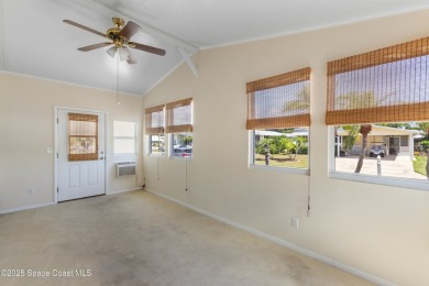 Welcome home to this mmaculate move-in-ready 2 bedroom 2 bath on Barefoot Bay Golf Course in Florida - for sale on GolfHomes.com, golf home, golf lot