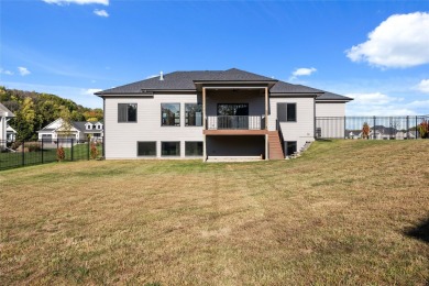 Welcome to this exceptional 5-bedroom, 4-bathroom home nestled on Tournament Club of Iowa in Iowa - for sale on GolfHomes.com, golf home, golf lot