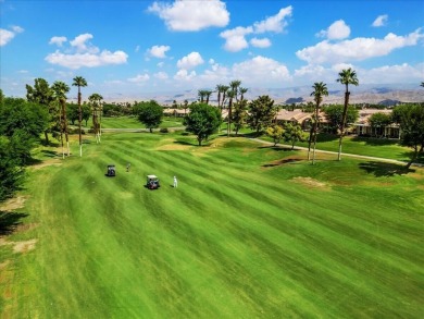 Stunning St. Croix model overlooking the 6th hole of the Santa on Mountain Vista Golf Course At Sun City Palm Desert in California - for sale on GolfHomes.com, golf home, golf lot