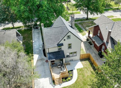 Fabulous and updated from top to bottom 3-story overlooking the on Maketewah Country Club in Ohio - for sale on GolfHomes.com, golf home, golf lot