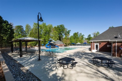 Work from home and need privacy? This exquisite home features an on The Divide Golf Club in North Carolina - for sale on GolfHomes.com, golf home, golf lot