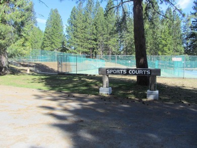 This property is .90 acres sloping towards beautiful Goose bay on Lake Almanor West Golf Course in California - for sale on GolfHomes.com, golf home, golf lot