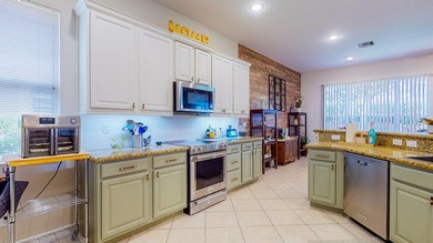 Welcome to this beautiful home located in the highly desirable on The Legacy Golf and Tennis Club in Florida - for sale on GolfHomes.com, golf home, golf lot