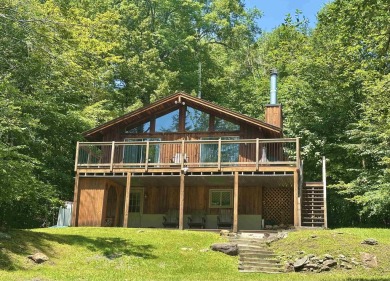 Welcome to this beautifully updated 3-bedroom, 2-bathroom home on Hermitage Club Golf Course in Vermont - for sale on GolfHomes.com, golf home, golf lot