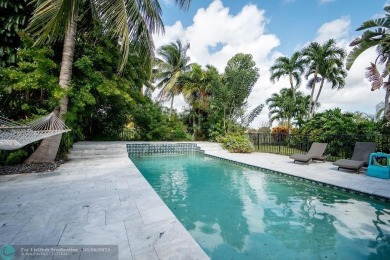 Impeccably remodeled, this 5-bedroom, 4.5-bathroom home, in the on Deer Creek Golf Club in Florida - for sale on GolfHomes.com, golf home, golf lot