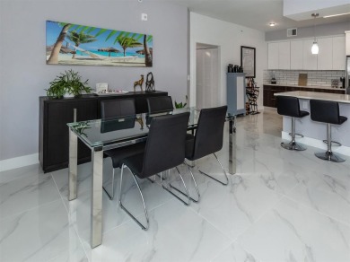 Modern, chic, first floor condo that is 3 years young and ready on Bird Bay Executive Golf Club in Florida - for sale on GolfHomes.com, golf home, golf lot