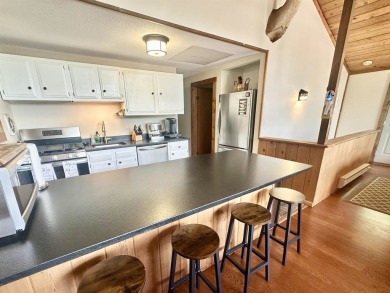 Welcome to this beautifully updated 3-bedroom, 2-bathroom home on Hermitage Club Golf Course in Vermont - for sale on GolfHomes.com, golf home, golf lot