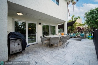 Impeccably remodeled, this 5-bedroom, 4.5-bathroom home, in the on Deer Creek Golf Club in Florida - for sale on GolfHomes.com, golf home, golf lot