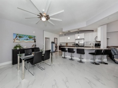 Modern, chic, first floor condo that is 3 years young and ready on Bird Bay Executive Golf Club in Florida - for sale on GolfHomes.com, golf home, golf lot