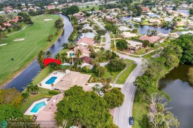 Impeccably remodeled, this 5-bedroom, 4.5-bathroom home, in the on Deer Creek Golf Club in Florida - for sale on GolfHomes.com, golf home, golf lot