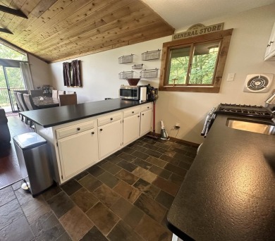 Welcome to this beautifully updated 3-bedroom, 2-bathroom home on Hermitage Club Golf Course in Vermont - for sale on GolfHomes.com, golf home, golf lot