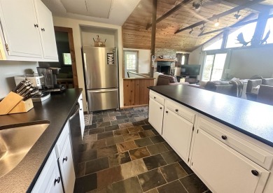 Welcome to this beautifully updated 3-bedroom, 2-bathroom home on Hermitage Club Golf Course in Vermont - for sale on GolfHomes.com, golf home, golf lot