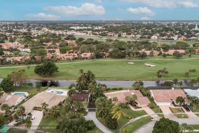 Impeccably remodeled, this 5-bedroom, 4.5-bathroom home, in the on Deer Creek Golf Club in Florida - for sale on GolfHomes.com, golf home, golf lot