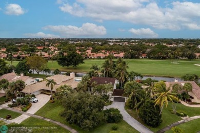 Impeccably remodeled, this 5-bedroom, 4.5-bathroom home, in the on Deer Creek Golf Club in Florida - for sale on GolfHomes.com, golf home, golf lot