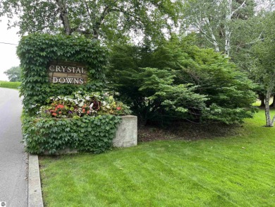 Woods and ferns cover this lovely parcel on the corner of Beach on Crystal Downs Country Club in Michigan - for sale on GolfHomes.com, golf home, golf lot