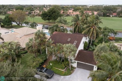 Impeccably remodeled, this 5-bedroom, 4.5-bathroom home, in the on Deer Creek Golf Club in Florida - for sale on GolfHomes.com, golf home, golf lot