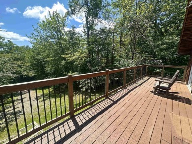 Welcome to this beautifully updated 3-bedroom, 2-bathroom home on Hermitage Club Golf Course in Vermont - for sale on GolfHomes.com, golf home, golf lot