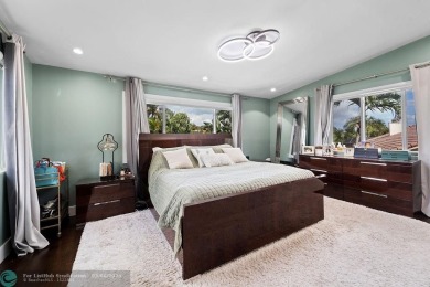 Impeccably remodeled, this 5-bedroom, 4.5-bathroom home, in the on Deer Creek Golf Club in Florida - for sale on GolfHomes.com, golf home, golf lot