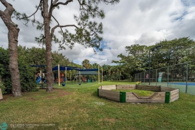 Impeccably remodeled, this 5-bedroom, 4.5-bathroom home, in the on Deer Creek Golf Club in Florida - for sale on GolfHomes.com, golf home, golf lot