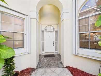 This charming & meticulously maintained home sits on a lush on Grand Palms Hotel and Golf Resort in Florida - for sale on GolfHomes.com, golf home, golf lot