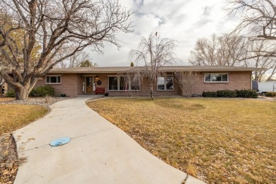 Welcome to this beautifully updated brick home nestled in the on Bookcliff Country Club in Colorado - for sale on GolfHomes.com, golf home, golf lot