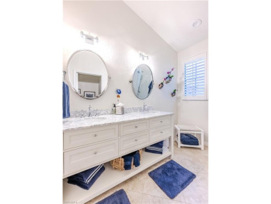 Enjoy breathtaking views over the serene lake and picturesque on Bonita Bay West in Florida - for sale on GolfHomes.com, golf home, golf lot