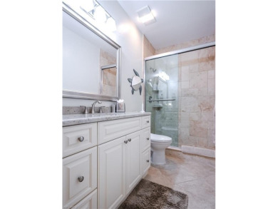 Enjoy breathtaking views over the serene lake and picturesque on Bonita Bay West in Florida - for sale on GolfHomes.com, golf home, golf lot