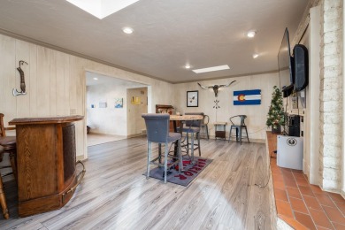 Welcome to this beautifully updated brick home nestled in the on Bookcliff Country Club in Colorado - for sale on GolfHomes.com, golf home, golf lot