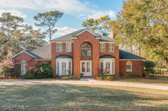 Welcome to this traditional, two-story, all brick home with a on The Deerwood Country Club in Florida - for sale on GolfHomes.com, golf home, golf lot