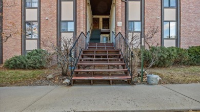 Beautifully updated and move-in ready, this ground-level condo on The Golf Club At Redlands Mesa in Colorado - for sale on GolfHomes.com, golf home, golf lot