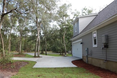 Discover Shellman Bluff's BEST kept secret with this charming on Sapelo Hammock Golf Club in Georgia - for sale on GolfHomes.com, golf home, golf lot