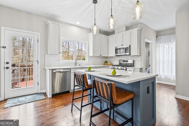 Welcome home to this 6-bedroom, 4-bath home tucked away on a on The Golf Club of Georgia in Georgia - for sale on GolfHomes.com, golf home, golf lot