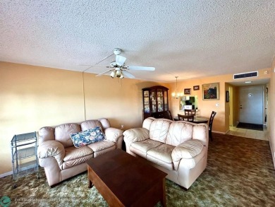 2-bedroom 2-bathroom condo located in the sought out all age's on Palm-Aire Country Club and Resort - Palms in Florida - for sale on GolfHomes.com, golf home, golf lot