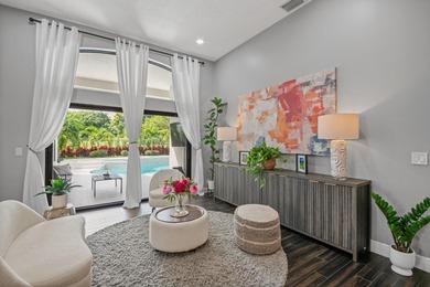 Welcome to a masterfully reimagined residence in the prestigious on Winston Trails Golf Course in Florida - for sale on GolfHomes.com, golf home, golf lot