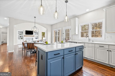 Welcome home to this 6-bedroom, 4-bath home tucked away on a on The Golf Club of Georgia in Georgia - for sale on GolfHomes.com, golf home, golf lot