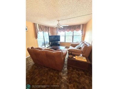 2-bedroom 2-bathroom condo located in the sought out all age's on Palm-Aire Country Club and Resort - Palms in Florida - for sale on GolfHomes.com, golf home, golf lot
