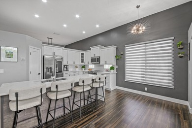 Welcome to a masterfully reimagined residence in the prestigious on Winston Trails Golf Course in Florida - for sale on GolfHomes.com, golf home, golf lot