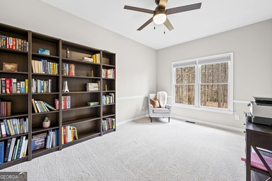 Welcome home to this 6-bedroom, 4-bath home tucked away on a on The Golf Club of Georgia in Georgia - for sale on GolfHomes.com, golf home, golf lot