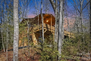 Escape to your own Blue Ridge retreat in the highly sought-after on Land Harbor Golf Course in North Carolina - for sale on GolfHomes.com, golf home, golf lot